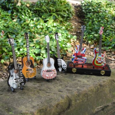 ORNAMENTAL GUITAR, CASE & STAND